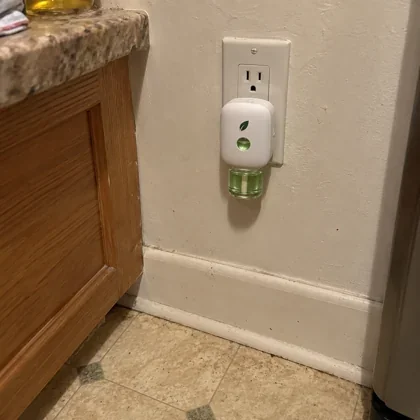 Shirley's phone photo: MintKeep plugged in low by her kitchen counter.