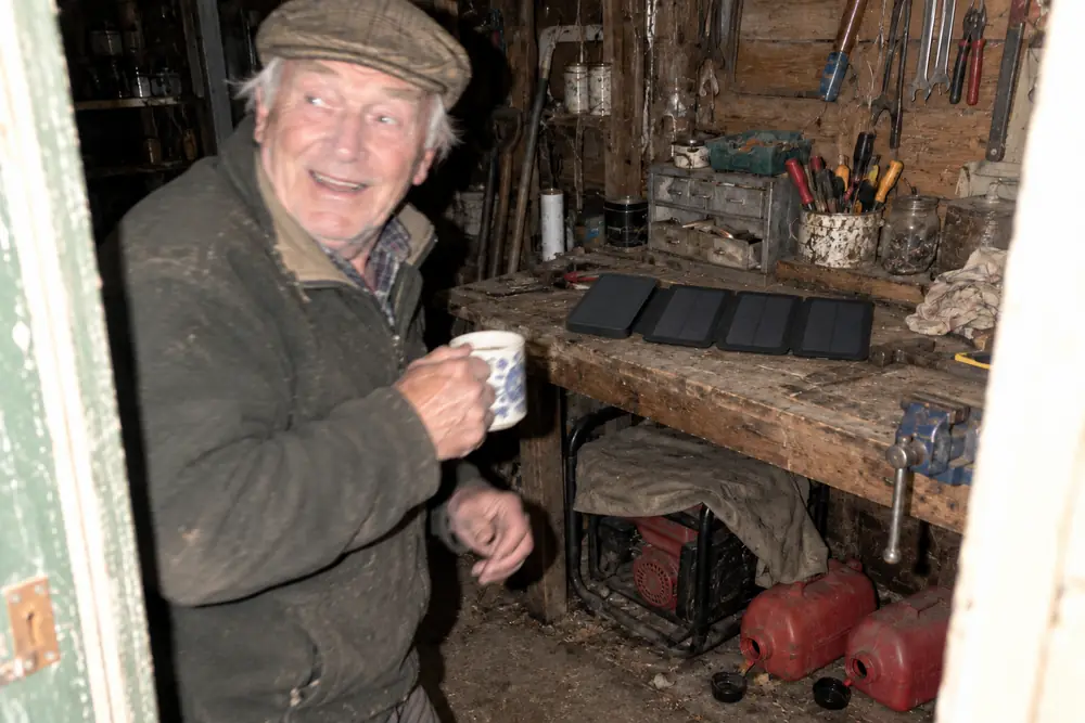 Harold in his shed, his TerraCell open on the bench