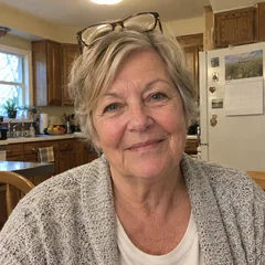 Brenda T., a woman in her late 60s at her kitchen table